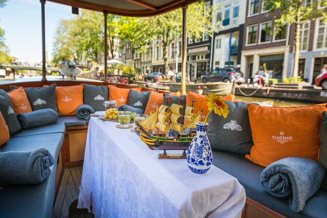 Amsterdam Canal Cruise in Classic Salon Boat With Drinks and Cheese - Guide Commentary That Turns Views Into Meaning