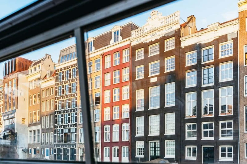 Amsterdam: Cozy Cheese & Wine Cruise Tasting Experience - Damrak Pier 5: Starting Your Canal Night in Warm Comfort