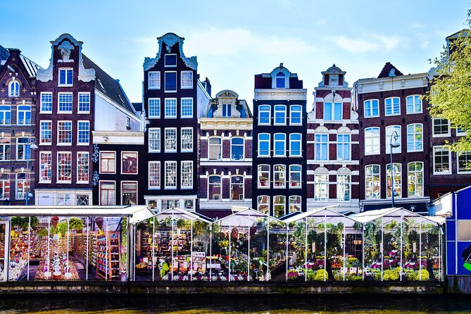 Amsterdam Day Trip from Brussels With Cheese, Clogs and Windmills - Arriving in Amsterdam: free time is the real deciding factor