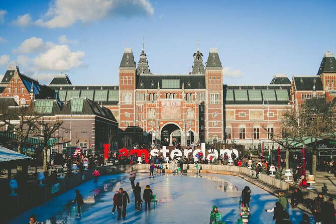 Amsterdam Day Trip from Brussels With Cheese, Clogs and Windmills - Dam Square and the Royal Palace area: where the guided walk makes sense
