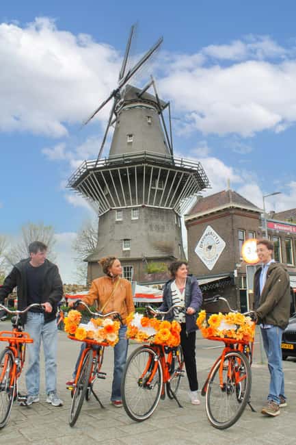 Amsterdam: E-Bike, Cheese, Windmill & Countryside Tour - Leaving Central Station for Polder Peace on an E-bike