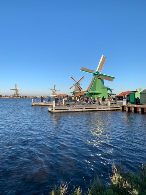 Amsterdam: Guided Zaanse Schans, Windmills & Cheese Tour - Optional Amsterdam canal cruise voucher: a calmer way to see the Golden Age