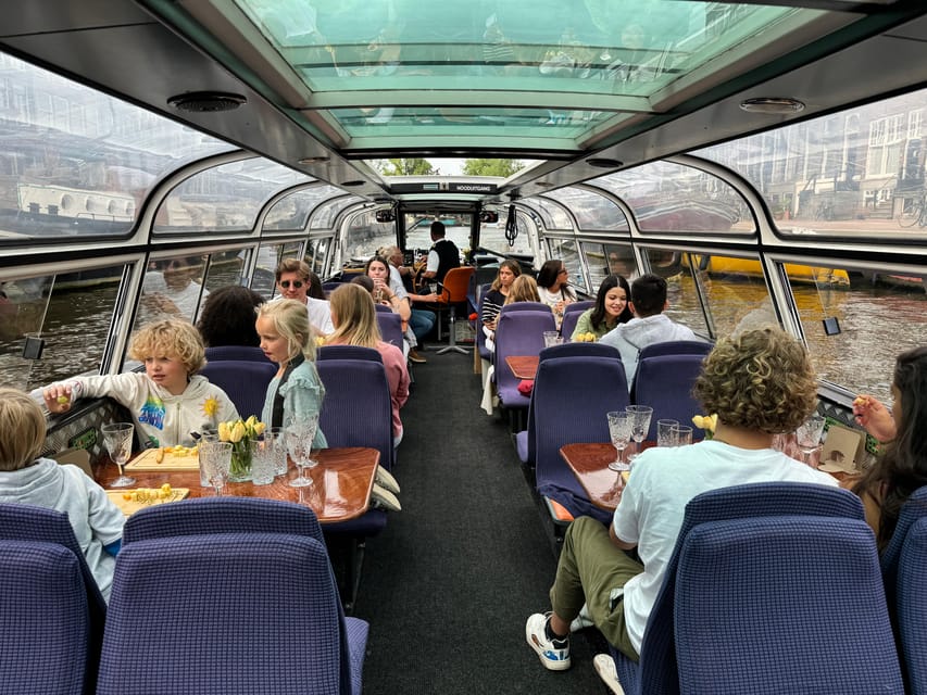 Amsterdam: Luxury Cheese & Wine Canal Cruise - Views from the canals: iconic landmarks and historic architecture