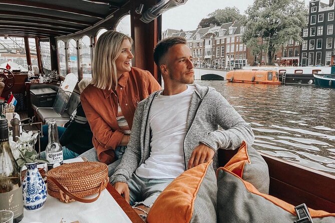Amsterdam Small-Group Bike Tour With Canal Cruise, Drinks, Cheese - ARTIS Zoo outskirts and the narrowest bridge crossing by bike