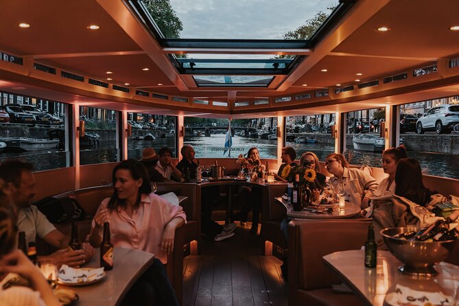 Amsterdam Small-Group Evening Canal Cruise Including Wine, Craft Beer, Cheese - Amsterdam at Night From the Water: Why This Works