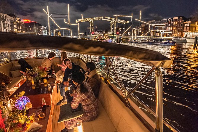 Amsterdam Small-Group Evening Canal Cruise Including Wine, Craft Beer, Cheese - Lighting Strategy: When the City Turns On