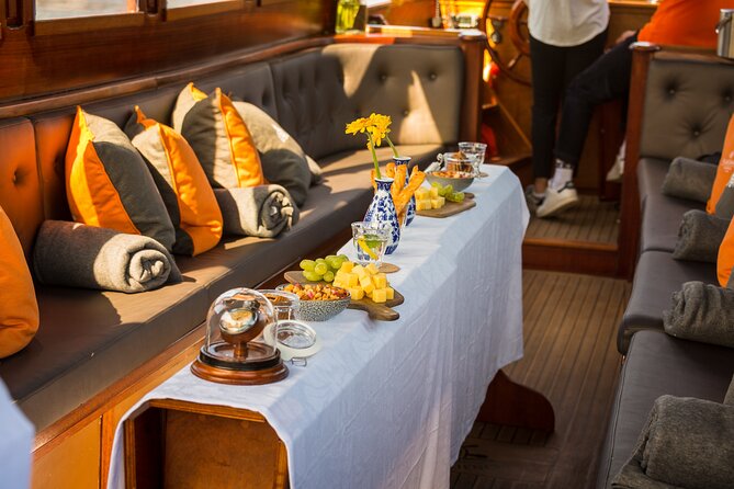 Amsterdam Walking Tour and Cruise with Drinks and Cheese Tasting - Why This Walk + Canal Cruise Combination Works in Amsterdam