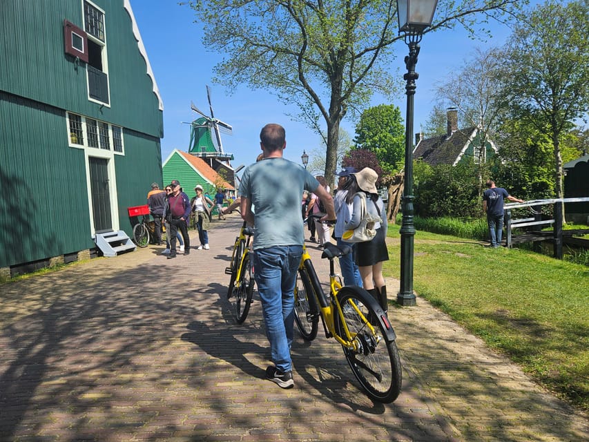 Amsterdam: Zaanse Schans E-Bike Tour with Windmills & Cheese - Guides, pacing, and what can vary