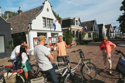 Cheese, Canals & Windmill Countryside E-Bike Tour Amsterdam - Amsterdam Centraal to Amsterdam North: the ferry-and-IJ moment