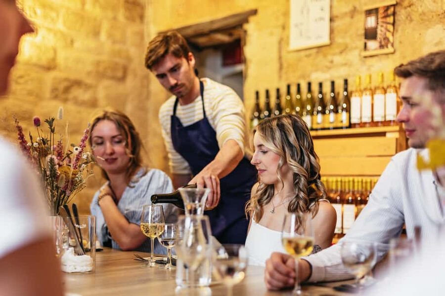 Cheese & Wine Tasting in Montmartre with Local Cheesemonger - Inside: Intimate Stone Walls and a Relaxed Small-Group Pace
