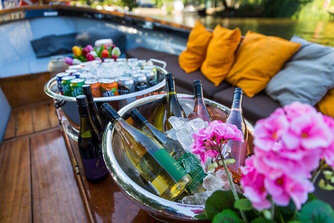 Classic Salonboat Tour in Amsterdam Including Cheese and Wine - Houseboat Museum and the reality of living on canals