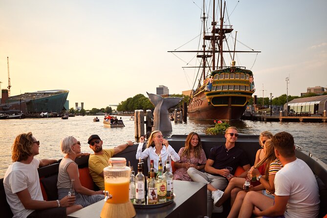 Classic Salonboat Tour in Amsterdam Including Cheese and Wine - Past the big squares: Nine Straatjes, Leidseplein, and Spiegelgracht