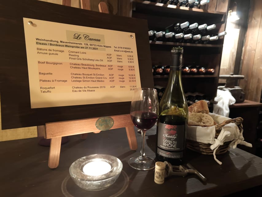 Cologne-Nippes: Cheese and wine with champagne and Grand Cru - Price and value: $93 for drinks, cheese, and guidance