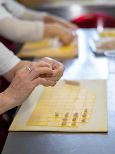 Formigine: Parmesan cheese tour with full tasting - The milk-to-curd moment: copper cauldrons and wheel-raising before 9:00 a.m.