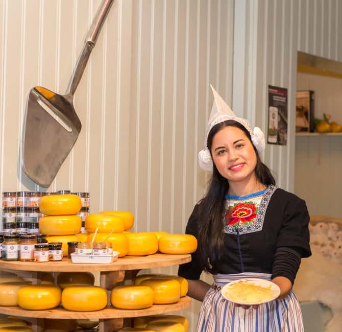 From Amsterdam: Volendam and Zaanse Schans Tour with Cheese - Zaanse Schans Windmills: More Than a Photo Stop