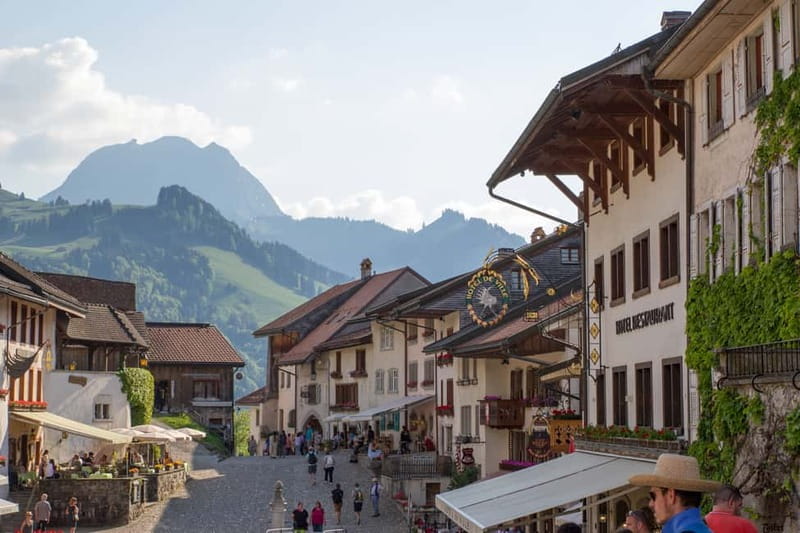 From Geneva: Gruyères Tour with Cheese & Chocolate Factories - Maison du Gruyère cheese museum: what you learn in 45 minutes