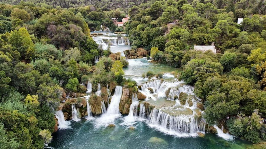 From Split: Krka Waterfalls with Wine & Cheese Tasting Tour - Skradin free time and the beach swim at the Adriatic edge