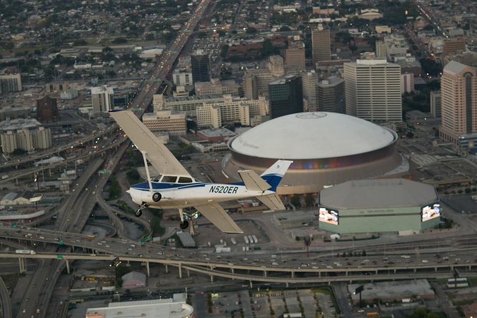 New Orleans VIP Sightseeing Flight with Champagne & Chocolates or Wine & Cheese - Downtown Landmarks: The Superdome and Smoothie King Center Overpasses