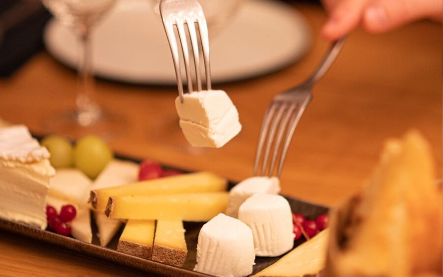 Paris: Apéro Wine and Cheese Tasting Experience - Inside Les Caves du Louvre: what the cellar experience feels like