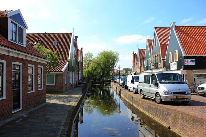 Private Sightseeing Tour to Windmills Cheese Farm and Volendam - Jacobs Hoeve Cheese Farm by Henri Willig: tastings plus the cow-stable view