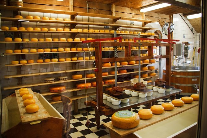Private Tulip Fields, Windmills and Cheese Tour from Amsterdam - Zaanse Schans windmills: pictures, woodcraft, and how industry looked