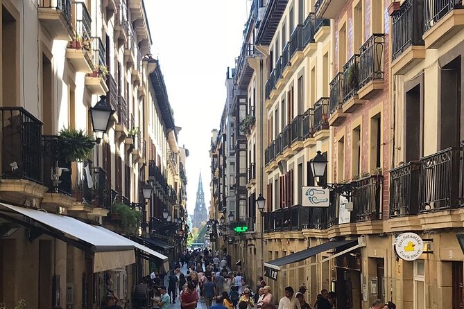 Visit San Sebastian and a Family Cheese Farm with Tasting (From Bilbao) - The txoko tasting: cider or wine with cheeses and views