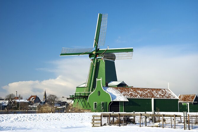 Zaanse Schans and Cheese Tasting Guided Tour from Amsterdam - The clog stop at Kooijman Souvenirs & Clogs: watch craft, then browse